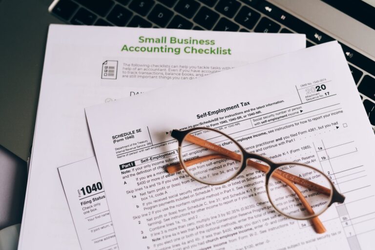 an eyeglasses on top of the documents