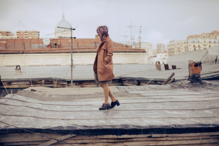 woman wearing brown trench coat